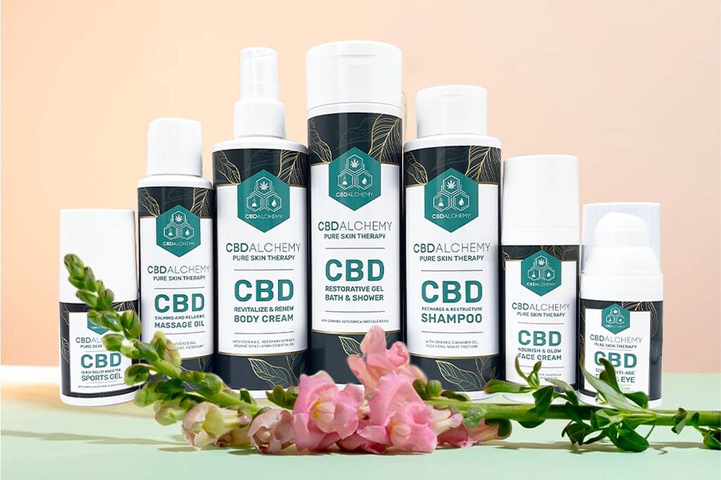 A display of CBD cosmetics including serums and creams.